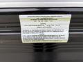 A close-up of a label on a 2021 Jayco Jay Flight displaying important information about the cargo carrying capacity and specifications of the recreational vehicle trailer