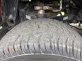 Close-up of a used tire on a 2019 Madvac LS175 showing worn tread patterns and dirt buildup on the surface