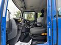 Interior of a 2017 Autocar Xpert showing the driver's seat steering wheel and dashboard with control panels