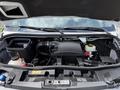 The image shows the engine bay of a 2022 Mercedes-Benz Sprinter featuring the engine, air intake system, coolant reservoir, and various components neatly arranged