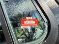 A red sticker on a window displaying the text British Columbia 2026 GK 23737 Certificate of Approval January