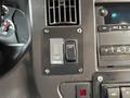 Dashboard controls of a 2020 Chevrolet Express showing power level settings and an interior light switch