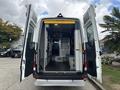 A 2020 Mercedes-Benz Sprinter 2500 with its rear doors open showcasing the interior layout and design