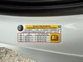 Tire and loading information sticker on a 2022 GMC Sierra 1500 detailing tire pressure and load capacity
