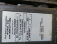 A 2020 Chevrolet Express showing a label with details about its lifting capacity and manufacturing date
