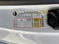 A 2019 Ford F-150 truck showcasing a tire and loading information label with details on seating capacity and tire pressure specifications