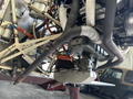A 1986 Sorrell Hiperbipe SNS-7 Amateur-Built Aircraft showcasing its detailed engine components with various pipes and fittings prominently displayed