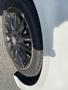 A close-up of the wheel and tire of a 2014 Mercedes-Benz CLA-Class showcasing the alloy rim and tread pattern