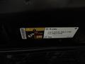 A label with information about a 2017 Dodge Charger including refrigerant type R-134a and specifications for engine sizes and weights