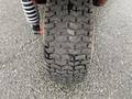 Close-up of a treaded tire from a 2017 Ferris Rotary showcasing distinct patterns and tire wear