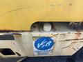 A yellow 1993 Hyster H80XL forklift featuring a faded logo of the Vancouver School Board on its side and visible signs of wear and rust