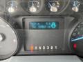 Dashboard display of a 2014 Ford F-550 showing trip information and odometer reading