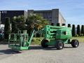 A green 2015 JLG 450AJ aerial lift with a platform on the left side and an extended boom on the right side