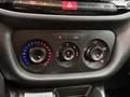 The control panel of a 2017 RAM ProMaster City featuring three circular knobs for temperature and fan speed settings along with a digital display and various function buttons