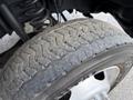 Close-up of a 2017 Ford F-550 tire showing tread patterns and sidewall details
