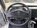 The interior view of a 2006 International 4300 showing the steering wheel dashboard and control panel