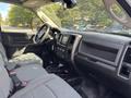 Interior view of a 2013 RAM 5500 showing the driver's seat dashboard and center console with controls and touchscreen display