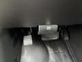 GMC Savana foot pedals including accelerator brake and an electronic parking brake button