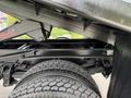 A 2017 Ford F-750 chassis displaying heavy-duty tires and undercarriage components including the frame and suspension system