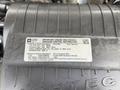 A label on a 2015 GMC Savana engine detailing important engine and vehicle emission control information including model and compliance standards