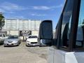 A 2019 Mercedes-Benz Sprinter van with a white exterior featuring a side mirror in focus