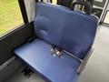 A blue bench seat with seat belts from a 2020 Chevrolet Express van