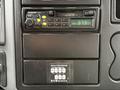 Dashboard of a 2006 International 4200 featuring a Panasonic audio system and a transmission panel with gear ranges displayed