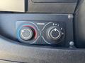 Close-up of a Webasto climate control panel featuring two rotary knobs for adjusting temperature and intensity settings in a 2020 RAM ProMaster 3500