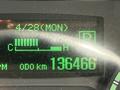 Display screen of a 2013 Mitsubishi Fuso FE160 showing the date April 28, fuel level indicators and an odometer reading of 136466 km