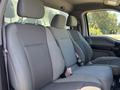 Interior view of a 2019 Ford F-150 showing three gray fabric seats with headrests and seat belts