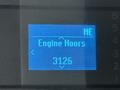 Display screen showing engine hours for a vehicle with the reading of 3126 hours