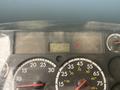 Dashboard display of a 2006 Freightliner M2 106 showing odometer at 321408 km and voltage at 14 volts
