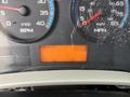 Dashboard of a 2013 International DuraStar 4300 displaying RPM speedometer and odometer reading of 22594 miles