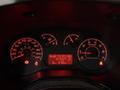 Dashboard of a 2017 RAM ProMaster City showing speedometer fuel gauge tachometer and digital display with various indicators and warning lights
