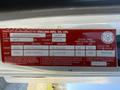 Label of a 2014 Hino 195 featuring vehicle specifications including VIN, weight ratings, tire sizes, and vehicle type details