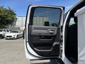 A 2021 RAM 5500 with its driver's door open displaying the interior door panel and handle