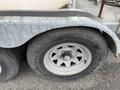 2011 Hightliner Aquacide Hot Water Weed Control Dual Flat Deck Trailer wheel showing a rusted rim and tire with tread detail