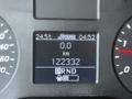 Dashboard display of a 2020 Mercedes-Benz Sprinter showing temperature 24.5°C odometer reading 122332 km and gear shift indicator with PRND configuration
