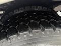 Close-up of the tread on a 2015 Ford F-450 tire showcasing its rugged pattern and surface detail
