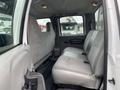 Interior view of a 2005 Ford F-350 SD showing the rear seating area with gray fabric seats and seatbelts