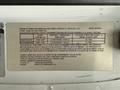 2019 Chevrolet Express with a vehicle information sticker displaying specifications and manufacturer details