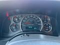 Instrument cluster of a 2024 Chevrolet Express showing speedometer fuel gauge and various indicator lights