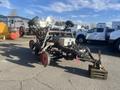 A 2017 R&R Reel featuring multiple attached wheels and a metal frame with a container labeled 185 on it