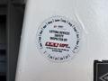 2019 Ford Transit 350 with a sticker displaying inspection details for lifting devices and contact information for A.M.B. LIFT Inc