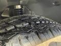 Close-up of a tire tread on a 2016 Mercedes-Benz Sprinter showing deep patterns and slight debris indicating used condition