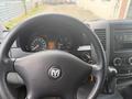 Interior view of a 2009 Dodge Sprinter Van showing the steering wheel dashboard and instrument panel with gauges and controls