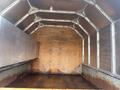 The image shows the interior of a 2011 Dodge Ram 5500 with a metal frame and wooden paneling designed for storage or transportation purposes