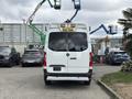 A 2020 Mercedes-Benz Sprinter 2500 viewed from the rear with taillights illuminated and no visible license plate