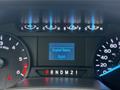 Dashboard of a 2024 Ford E-450 showing instrument gauges and a display indicating engine hours of 2444
