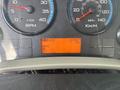 Dashboard of a 2012 International 7300 Workstar displaying RPM speedometer odometer temperature and gear information